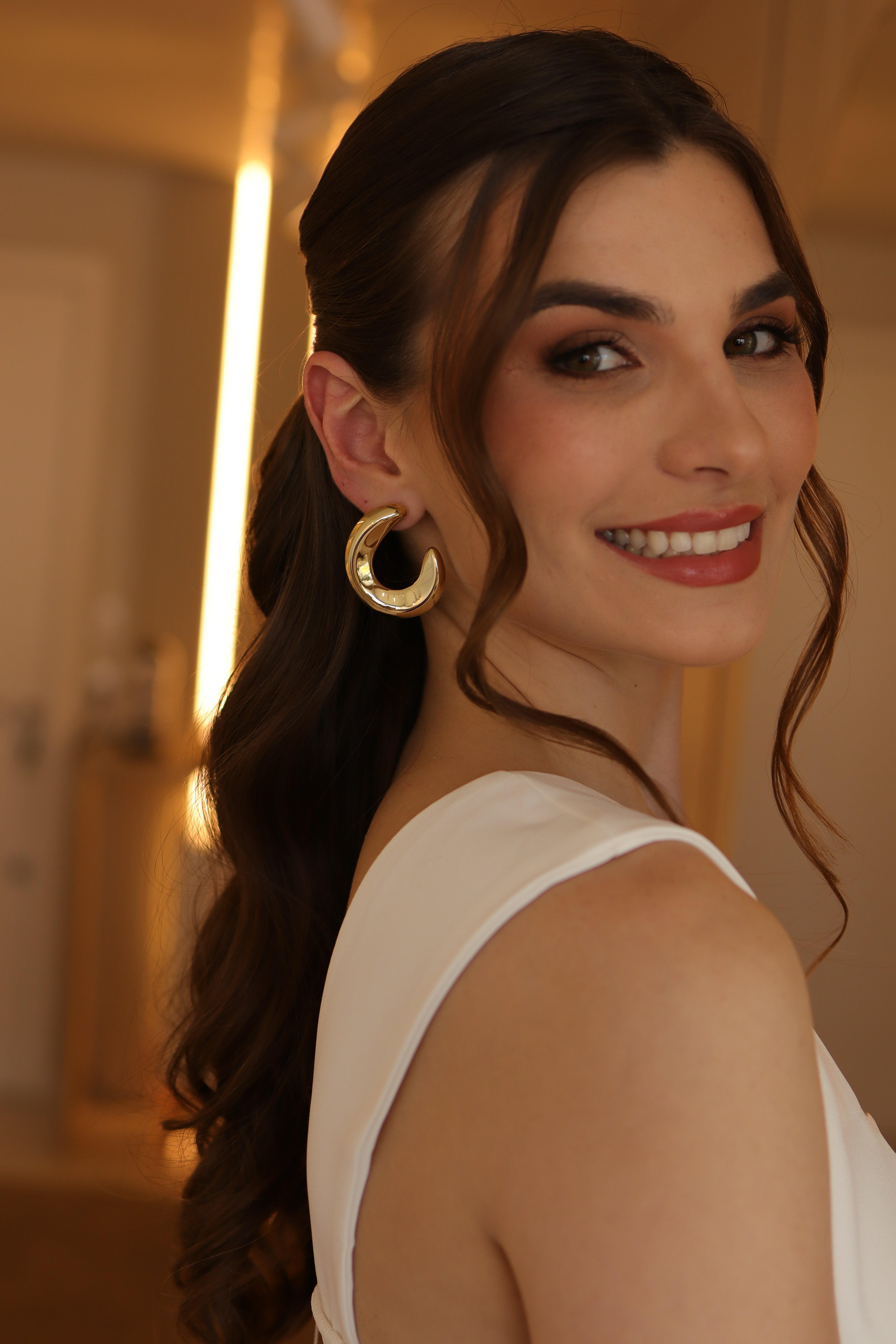 Brinco Curva Lisa Dourada