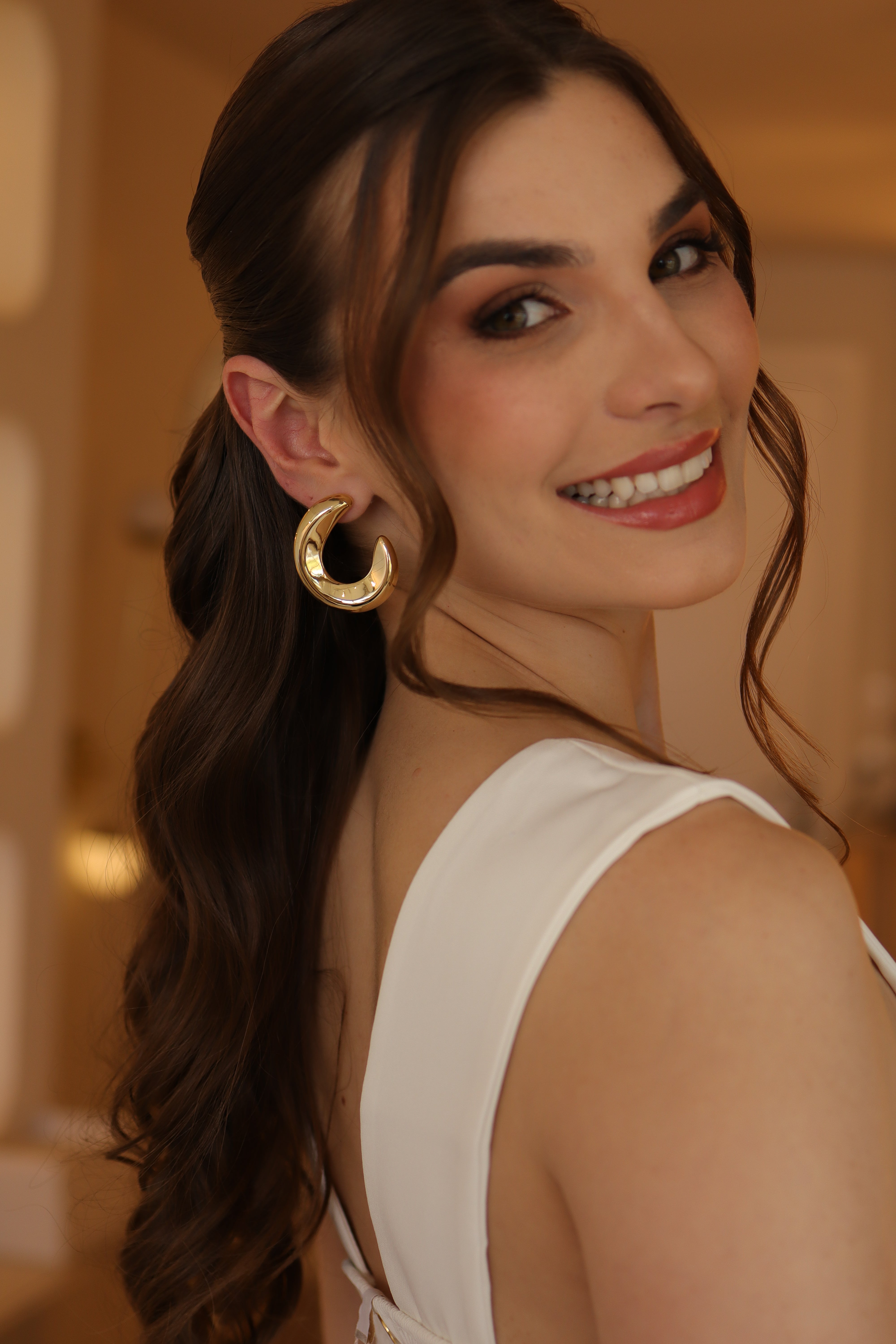 Brinco Curva Lisa Dourada